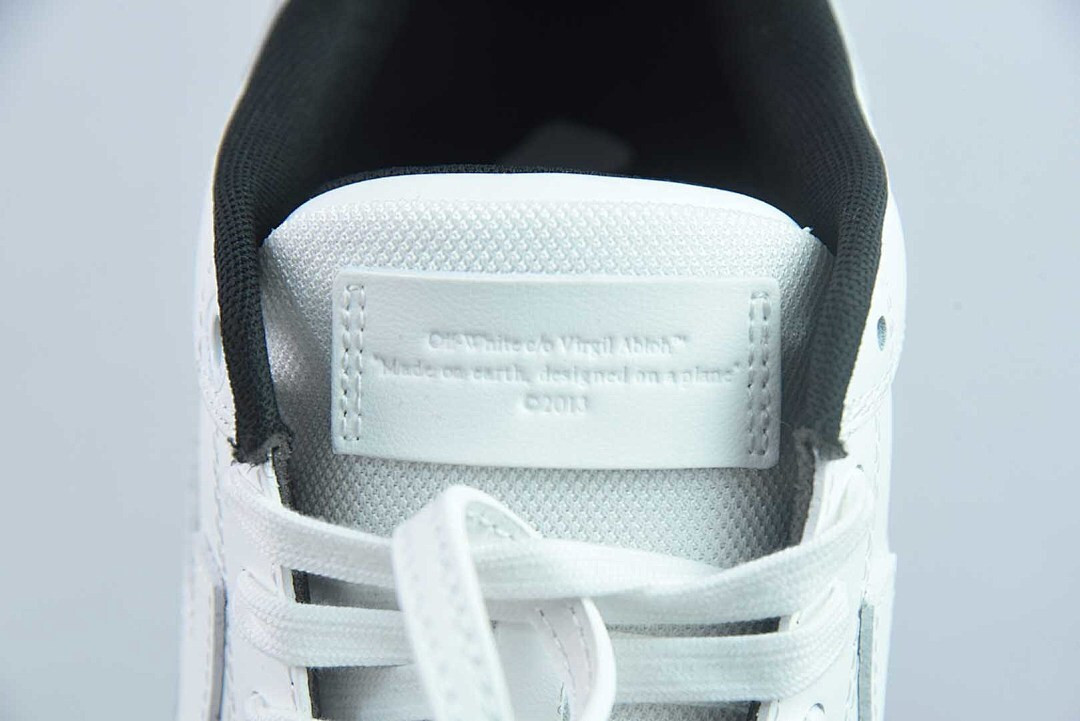 OF™ C/O VIRGIL ABLOH OUT OF OFFICE LOW-TOP LEATHER SNEAKERS ‘OOO“